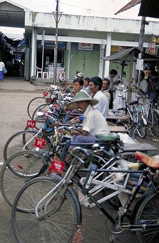 Rickshaw drivers lay in wait for customers.