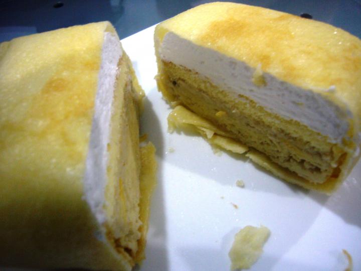 Durian pancake with the layers of durian flesh, cake, and cream.