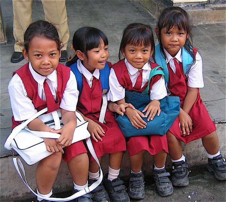 Little girls greet me as I enter an elementary school in Bali. 