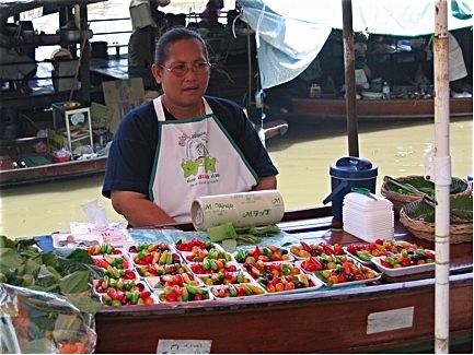This fruit seller had a business on her boat