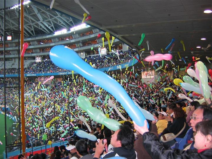 Fans release balloons at a baseball game in Osaka.