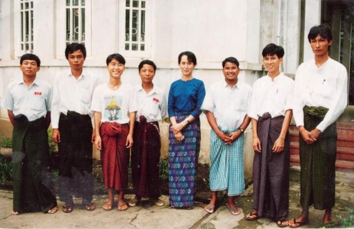 Iqbal in his younger days, standing to Daw Aung San Suu Kyi's immediate left