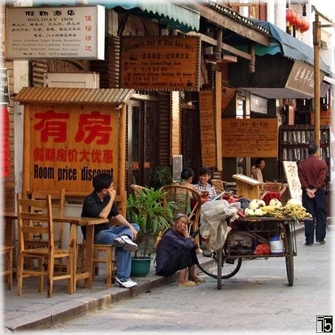 Waiting for the customer  (West street, Yangshou, Guangxi province, China)