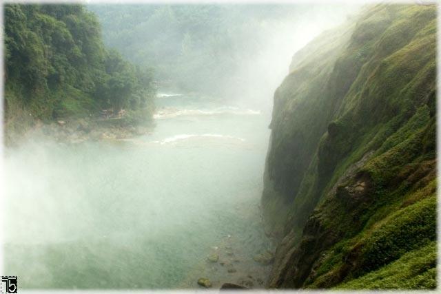 Spindrift of the Huangguoshu waterfall spraying through the valley (Guizhou province)