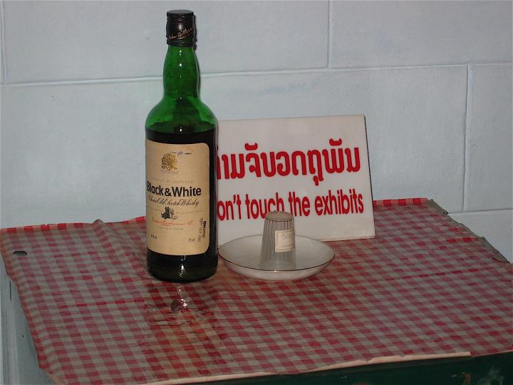 Communist leader Kaysone's whiskey bottle and glass