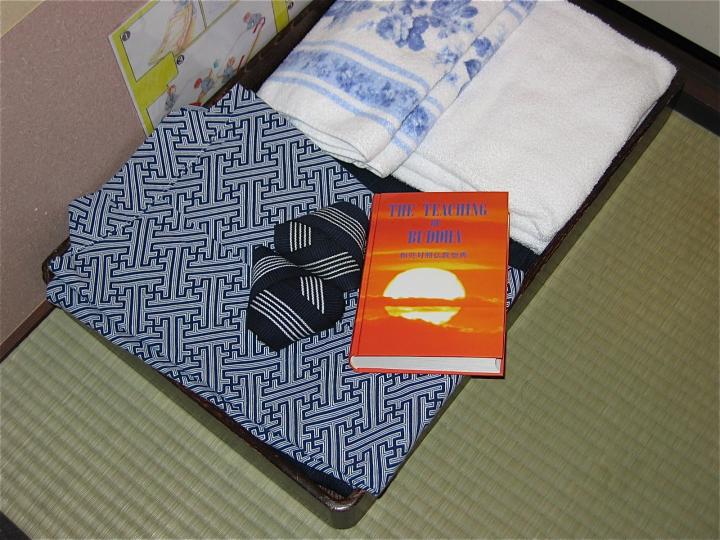 Neatly folded kimonos and the Buddhist Scriptures were provided in our ryokan