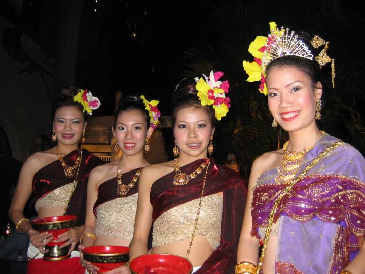 Lovely women in traditional costume served our Loy Krathong dinner.