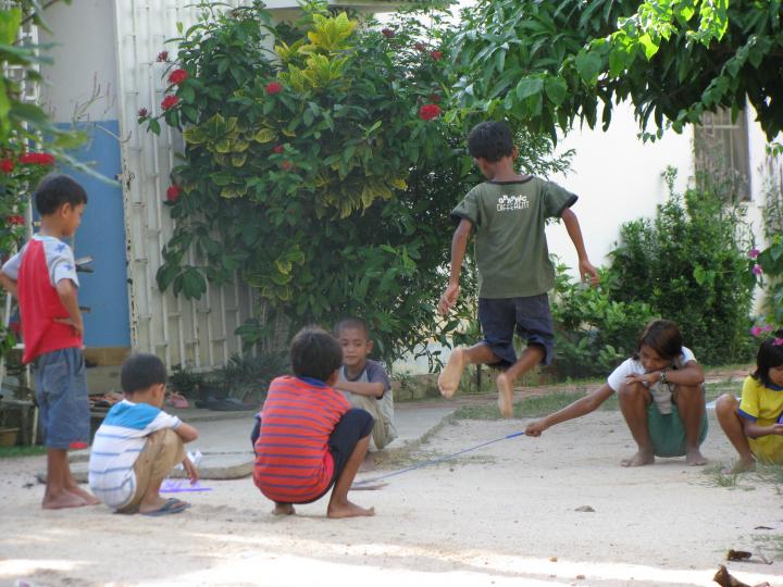 Children play on the grounds home to Partners In Compassion.