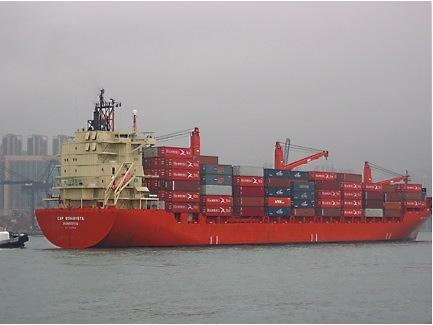 A ship comes into the Hong Kong container port