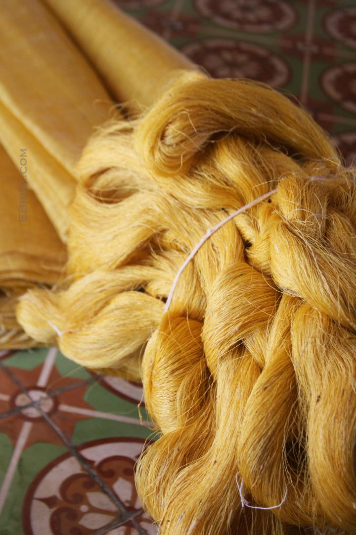 Raw golden silk in Vietnam, waiting to be spun.