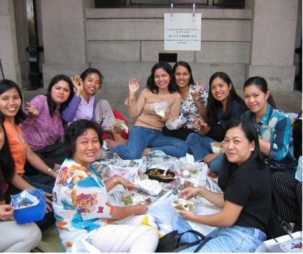 Filipino maids in outside the Hong Kong Law Courts Building. 