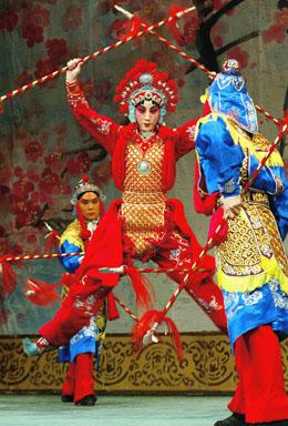 Li Hong Yan (C) from the Mei Lanfang Peking Opera Company rehearses 'a Pearl on Rainbow Bridge' at the Sydney Opera House. Following recent sell-out tours to Europe and the USA the company of over 40 extraordinary artists from Beijing will perform in Australia (in 2003) for the first time ever during it's 80 year history presenting three shows only at the Sydney Opera House.