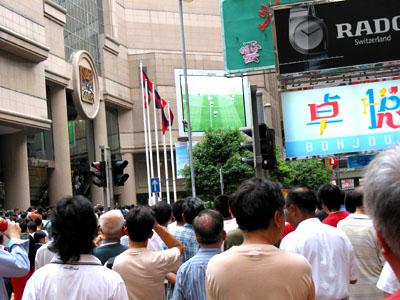 June 21, 2002, Hong Kong. A very nice and hot Friday afternoon. Brazil faces England in the quarterfinals. Your friends are in Japan watching the game. Still, there are many places you can catch the game from Hong Kong. One of them is Times Square, one of Hong Kong's major shopping malls.