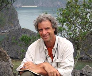 The author grins with satisfaction after seeing his first Cat Ba Langur.