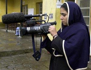 Afghan woman, Mehrya, is one of 13 trained by the French non-governmental organization Aina (mirror) as a camerawoman.