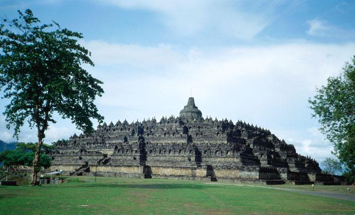 Located on Indonesia's island of Java, twenty-six miles northwest of Yogyakarta, the ancient sanctuary Borobudur is the world's largest Buddhist monument. Dating from the mid eighth century AD, and constructed over a period of over a hundred years, Borobudur was mysteriously abandoned early in the tenth century.