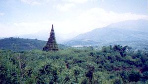 Landscape, Xieng Khuang, Lao. This was once a provincial capital. During the Secret war it was devastated by carpet bombing. Now this lone chedi stands as a memorial to the lost city.