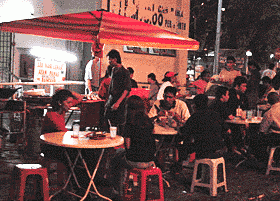 At the mamak stalls. Have your meal by the roadside.