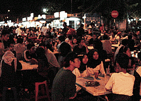 A melting pot - Malaysians sitting down for a drink in true cultural spirit