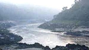 The early morning mist lifts off the Mekong River at Pakbeng.