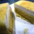 Durian pancake with the layers of durian flesh, cake, and cream.