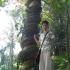 Me in front of a tree strangled by the vine Phytocrene macrophylla