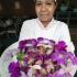 A Thai chef shows an orchid salad made with flowers at a restaurant at the Rose Garden resort in Nakhon Pathom province.