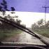A rainstorm in southern Thailand seen from behind the wheel.