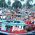Colourful fishing boats line the waterfront, in Duong Ðong town, Phu Quoc, Vietnam.