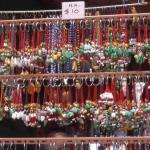 Lucky jade pendants on sale at Cat Street Bazaar.