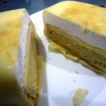 Durian pancake with the layers of durian flesh, cake, and cream.