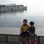 My kids, Kanthaprasad and Kancana Preetika at Baywalk, with a ferry in the background. 
