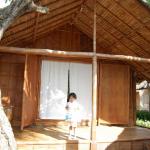 My daughter Kancana Preetika outside our bamboo cabana