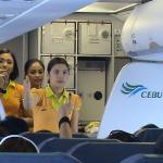 Flying with a Filipino touch, Cebu Pacific cabin crew playing fun trivia and show-me-games