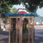 A classically-roofed telephone booth