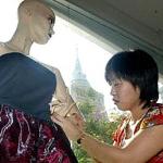 A Thai design student works on a creation during her fashion course at the Wat Dammamongkol temple in Bangkok.