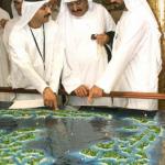 Crown Prince Sheikh Mohammed bin Rashed al-Maktum (R) looks at a display showing the Atlantis man-made island project during a launching ceremony of the luxurious 2,000-room resort and water theme park off the coast of Dubai, 21 September 2003 at a hotel in the Gulf emirate. The 650-million dollar first phase of the Atlantis' project, which is inspired by Kerzner International's Paradise Island in the Bahamas, adds to a boom in tourist infrastructure investment in Dubai, including the construction of dozens more five-star hotels. The project is a joint venture between Kerzner and Dubai's property developer Nakheel LLC.