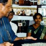Sri Lankan master tea maker Malinga Herman Gunaratne (L) shows his exotic 'Kilburn Imperial' tea at his Handuugoda tea plantation in southern Sri Lanka.