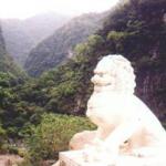 The marble dragon stands as a guardian to the famous gorge