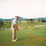 Robert Strauss getting ready to tee off at the Dalat golf course.