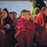 Female monks watching one of the many New Year's festival ceremonies.