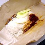 The most basic form of nasi lemak; still in its wrapper.