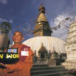 A Buddhist Monk walks past Swayambhunath stupa.