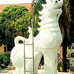 The singh, or lion-dragon, typically appears sitting at entrances to a wat, including Bangkok's Wat Phra Keo. Harmless to humans, the singh inhabits the mythical forest Himaphan, a place of never-ending rice.